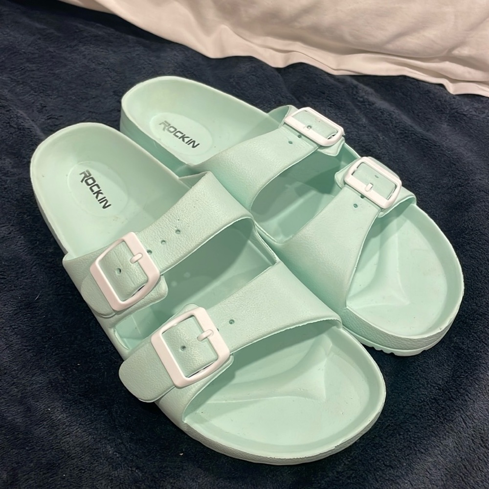 Gently‎ worn sandals